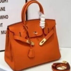 Elegant Learher Orange Women's Satchel Size 30 NWOT
